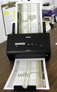 The Brother ImageCenter ADS-3000N as tested, shown with legal-sized originals in the input and output trays.